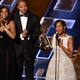 Regina King (right) accepts the Outstanding Supporting Actress in a Limited Series or a Movie Emmy for American Crime from Taraji P. Henson and Terrence Howard during the 67th Annual Primetime Emmy Awards Sept. 20, 2015, in Los Angeles.
Kevin Winter/Getty Images